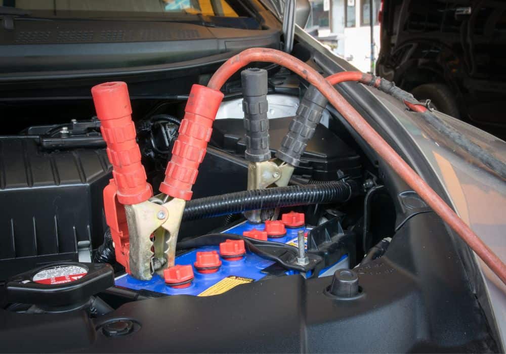 How is the battery charged with a different vehicle