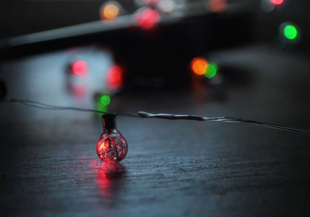 What do you need to light a bulb with a battery and a wire?