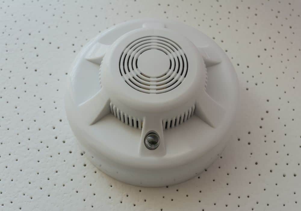 Uninstall the smoke detector carefully.